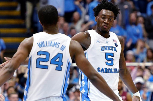 UNC's Nassir Little, who scored 18, is congratulated by Kenny Williams. (UNC Sports Information photo.)