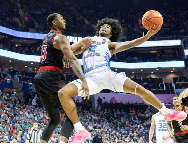 UNC's freshman point guard Coby White was an acrobat all night. (UNC Sports Information photo.)