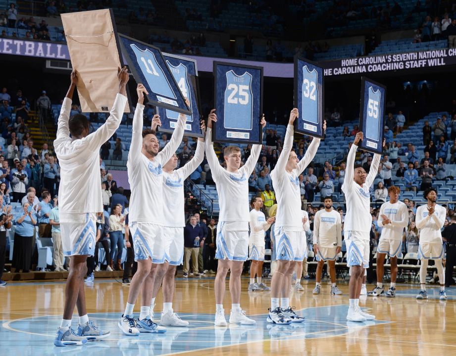 Six Tar Heels, including four-year seniors Brandon Robinson and Shea Rush, the two on the left, played their last home game for Carolina. (UNC Athletic Communications)