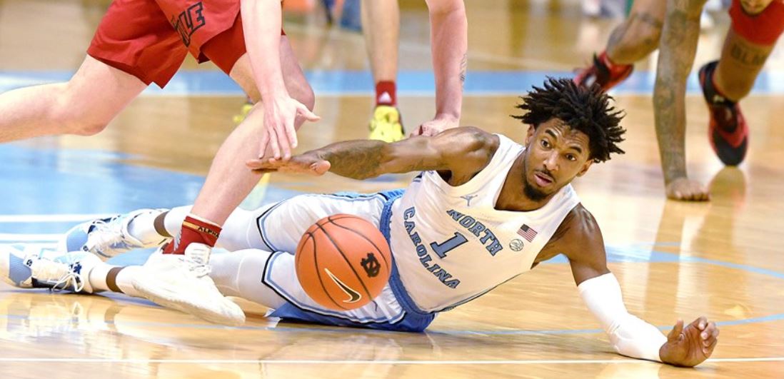UNC's Leaky Black dives for a loose ball. (UNC Sports Information photo)