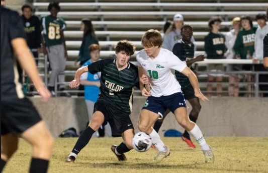 ason Hinkle (2) of Enloe and Cole Stapleton (10) of Leesville Road. Leesville Road clinched the Cap 6 Conference championship with a 3-1 win at Enloe on Wednesday, October 25, 2023. (Photo By: Nick Stevens/HighSchoolOT)