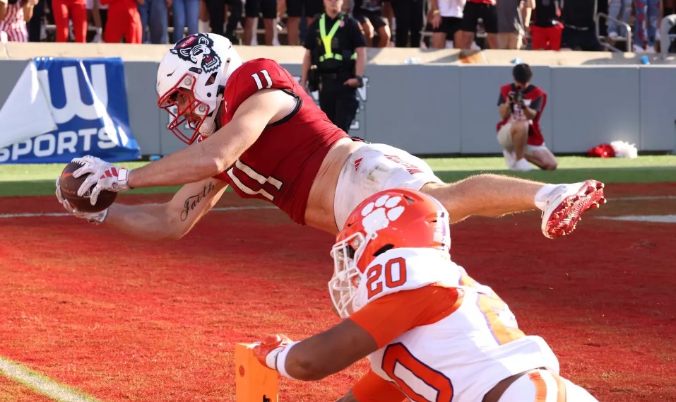 A Memorable Win for Many Reasons Payton Wilson dives for his first career touchdown