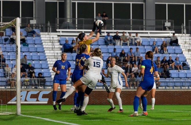 UNC women’s soccer drops first game of the season 2-1 in ACC Tourney opener Photo by Derek Peng / The Daily Tar Heel Pittsburgh sophomore goalkeeper Ellie Breech (0) blocks a ball during the match against UNC in the first round of the ACC Women's Soccer Championship at Dorrance Field on Sunday, Oct. 29, 2023.