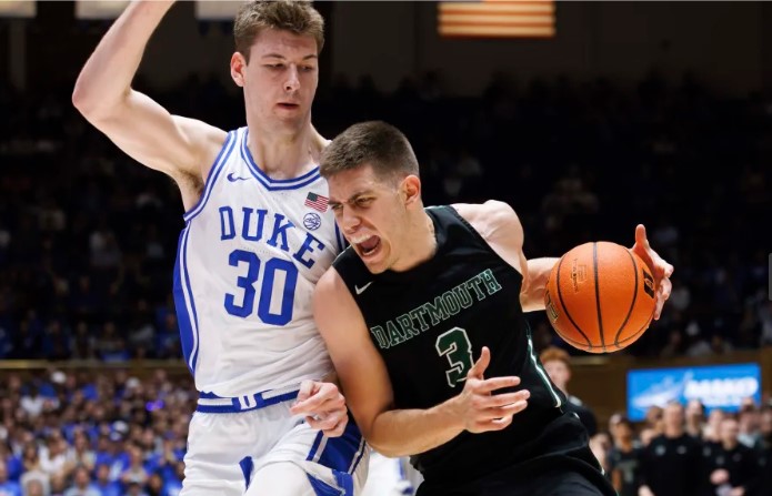 Dartmouth's Dusan Neskovic (3) drives against Duke's Kyle Filipowski (30) during the first half of an NCAA college basketball game in Durham, N.C., Monday, Nov. 6, 2023. (AP Photo/Ben McKeown)ASSOCIATED PRESS