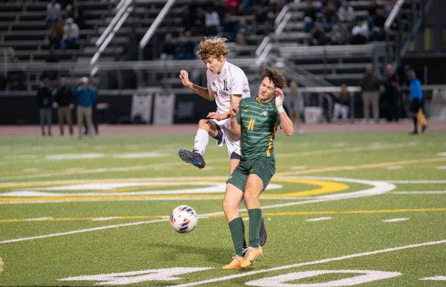 Apex Friendship delivers shutout at Cardinal Gibbons to advance to 4A soccer championship Scott Wildes (11) of Apex Friendship and Connery Bunn (11) of Cardinal Gibbons. Apex Friendship defeated Cardinal Gibbons 3-0 in the NCHSAA 4A boys soccer eastern regional championship on Tuesday, November 14, 2023. (Photo By: Nick Stevens/HighSchoolOT)