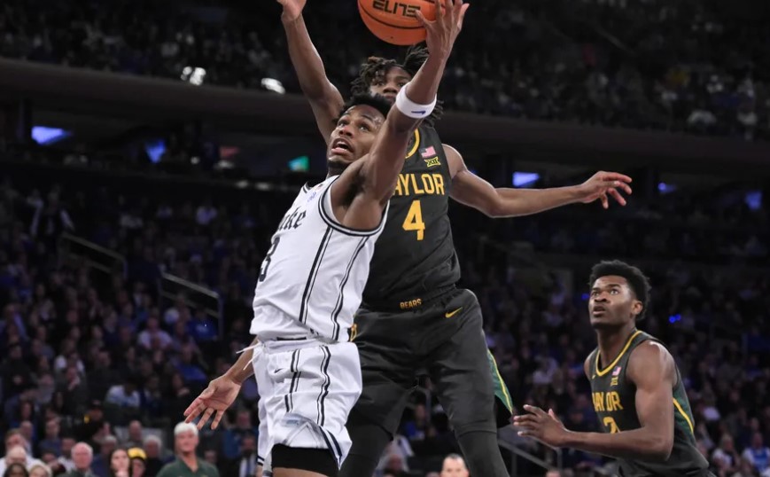 Duke Blue Devils guard Jeremy Roach (3) shoots the ball as Baylor Bears guard Ja’Kobe Walter (4) defends during the first half at Madison Square Garden. John Jones-USA TODAY Sports