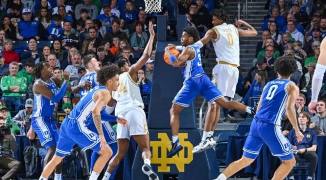 Duke Blue Devils guard Jeremy Roach (3) grabs a rebound in front of Notre Dame Fighting Irish forward Carey Booth (0) in the second half at the Purcell Pavilion.