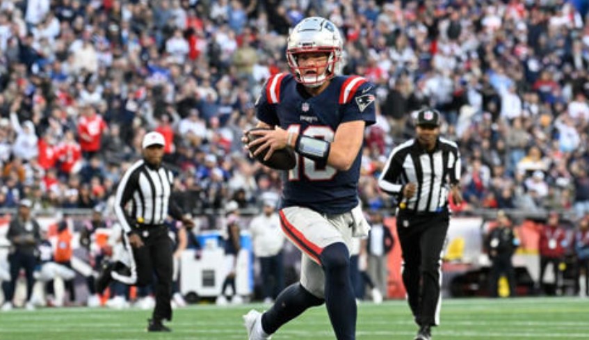 New England Patriots quarterback Drake Maye (10) runs the ball against the Los Angeles Rams during the second half at Gillette Stadium. Mandatory Credit: Eric Canha-Imagn Images