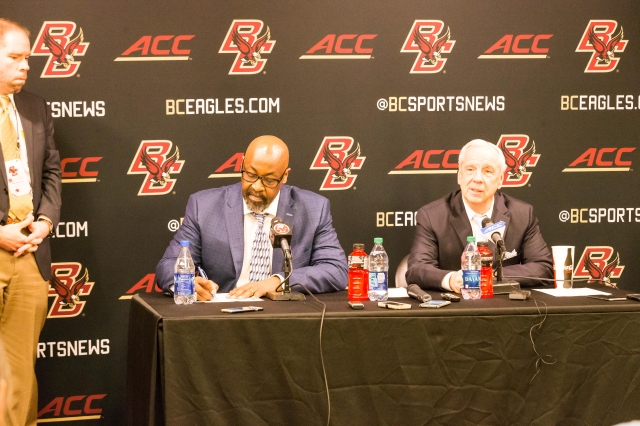 Carolina loses coach, wins game late