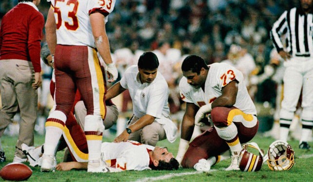 Joe Theismann’s leg injury in 1985 remains one of the most gruesome and memorable moments in sports history, and the former Washington quarterback recalls the experience when speaking on handling life changes. (J. Scott Applewhite / AP Photo)