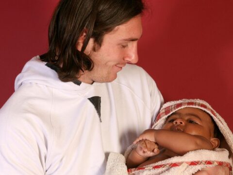 Topps to release a trading card of the photo of a young Messi holding infant Lamine Yamal Topps to release a trading card of the photo of a young Messi holding infant Lamine Yamal