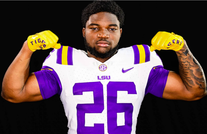 Why is LSU transfer running back Jackson wearing No. 62 in practice?