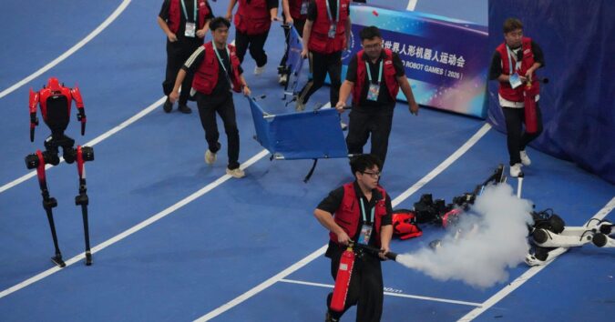 A robot sprinter shatters a 100-meter record again as sparks fly at China’s robot competition