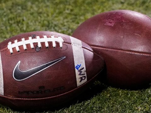 College sports kicks off its season under the long shadow of court fights over eligibility