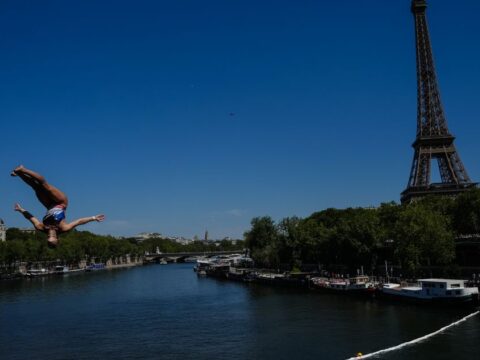 High divers take the plunge in the Seine in a new test of Paris’ reclaimed river High divers take the plunge in the Seine in a new test of Paris’ reclaimed river