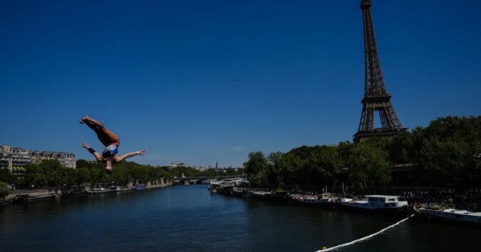 High divers take the plunge in the Seine in a new test of Paris’ reclaimed river