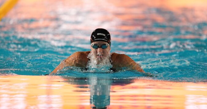 Kate Douglass blazes to 50 free world record in Pan Pacific prelims
