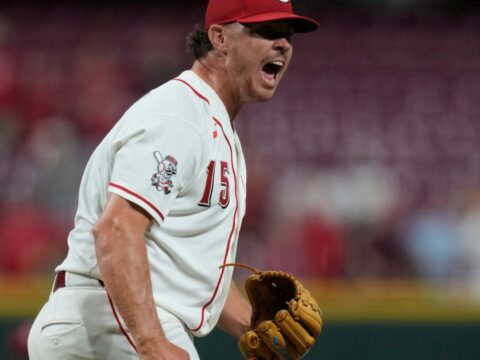 McLain homers to back Lowder in the Reds' 3-2 victory over the A's