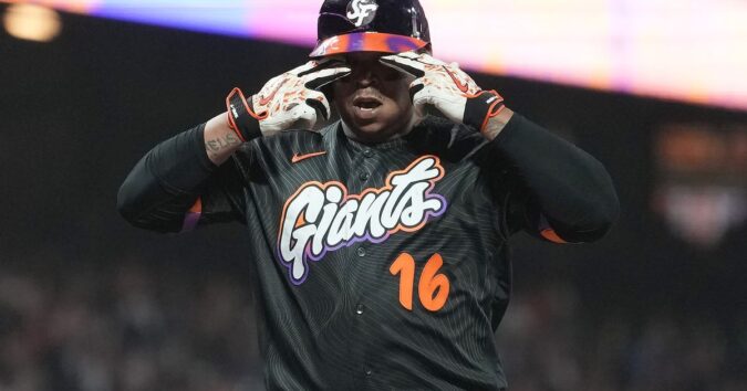 Rafael Devers bounces a homer into McCovey Cove as Giants beat Reds 3-1