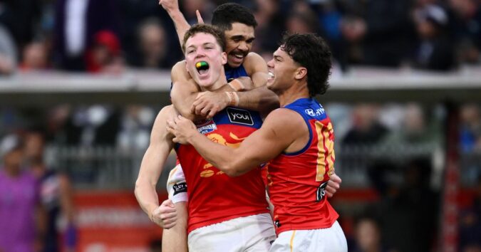 A three-peat for the Brisbane Lions: a trio of Australian rules football titles in a row A three-peat for the Brisbane Lions: a trio of Australian rules football titles in a row