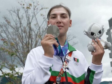 Afghan female cyclist wins silver at Asian Games after disguising herself as a man to train
