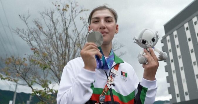Afghan female cyclist wins silver at Asian Games after disguising herself as a man to train