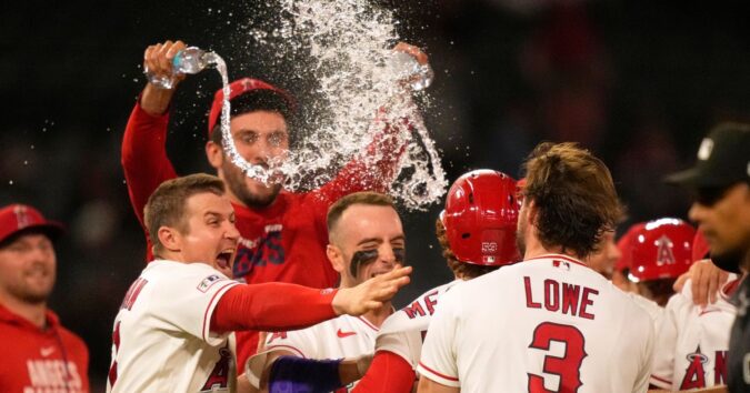 Angels blow 9th-inning lead, then rally for 2 in the 10th to edge Twins 5-4