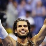 Carlos Alcaraz recovers after dropping the first set to reach the third round at the US Open