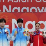 Chinese 13-year-old Yu Zidi starts quickly in the pool at the Asian Games