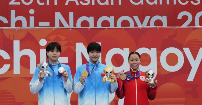 Chinese 13-year-old Yu Zidi starts quickly in the pool at the Asian Games