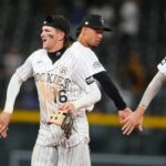Cole Carrigg goes 4 for 5 and the Rockies defeat the Padres 9-3 to end 8-game losing streak