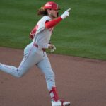 Harper atones for outfield gaffe, Bohm homers in 10th as Phillies beat Braves 4-3 to force Game 3
