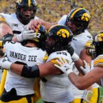 Iowa moves up to No. 14 in AP Top 25 and goes into Buckeyes showdown as possible playoff contender