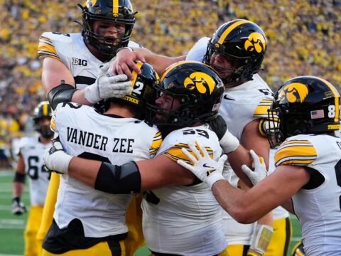Iowa moves up to No. 14 in AP Top 25 and goes into Buckeyes showdown as possible playoff contender