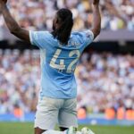 Man City wins 8-goal thriller against Sunderland to move clear at top of Premier League