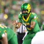 Moore throws for 4 TD passe as No. 21 Oregon routs Portland State 84-0