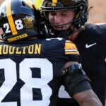 No. 22 Iowa uses defense, Moulton's running game to beat Northern Illinois 40-0