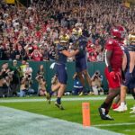 Notre Dame's Flanigan continues family tradition by delivering at Lambeau