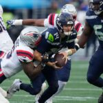 Sam Darnold injures hip on Seahawks' first series of opener and is ruled out for rest of game
