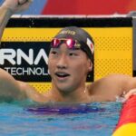 Shin Ohashi of Japan sets world record in 200-meter breaststroke at the Asian Games