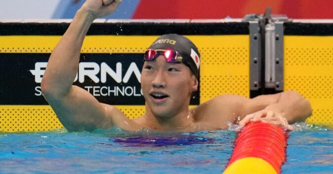 Shin Ohashi of Japan sets world record in 200-meter breaststroke at the Asian Games