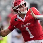 Weigman throws for 305 yards and leads No. 23 Houston to a 33-20 win over Oregon State