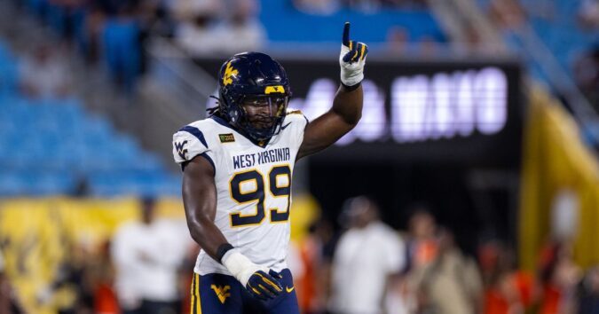 West Virginia beats No. 25 Virginia 38-27 in the Duke’s Mayo Classic