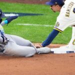 Balls glancing off gloves, runners thrown out trying to steal sink Rays in World Series opener