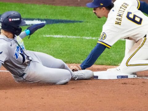 Balls glancing off gloves, runners thrown out trying to steal sink Rays in World Series opener