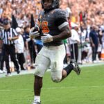 Bishop rushes for 220 yards, 3 TDs to lead No. 17 Tennessee over Auburn 24-14