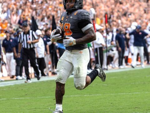 Bishop rushes for 220 yards, 3 TDs to lead No. 17 Tennessee over Auburn 24-14