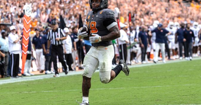 Bishop rushes for 220 yards, 3 TDs to lead No. 17 Tennessee over Auburn 24-14