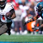 Bucky Irving runs for 2 TDs and Bucs force 4 turnovers in 43-13 rout of Panthers