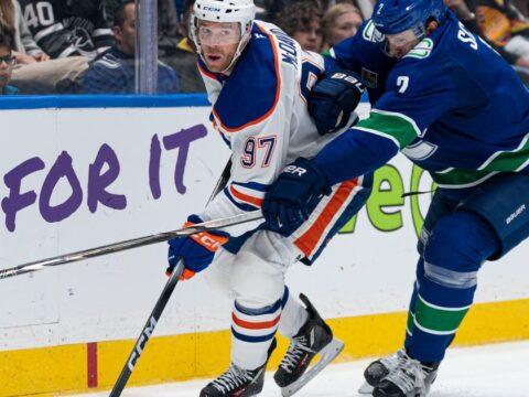 Connor McDavid has a goal and four assists as the Oilers hang on to beat the Canucks 9-7